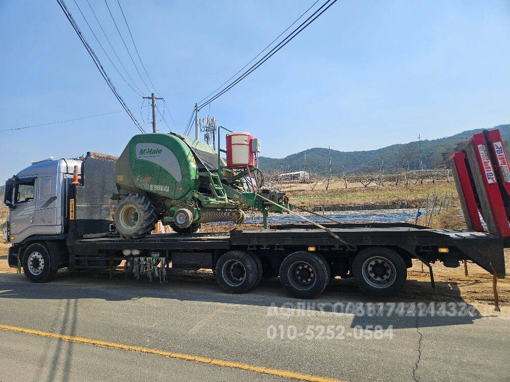  농기계.건설기계.베일러셋트 운송합니디 1톤셀프.셀프로더.로베드추레라  앞좌측면