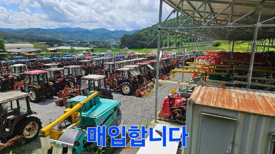뉴홀랜드 트랙터 TL100A (100마력) 앞좌측면