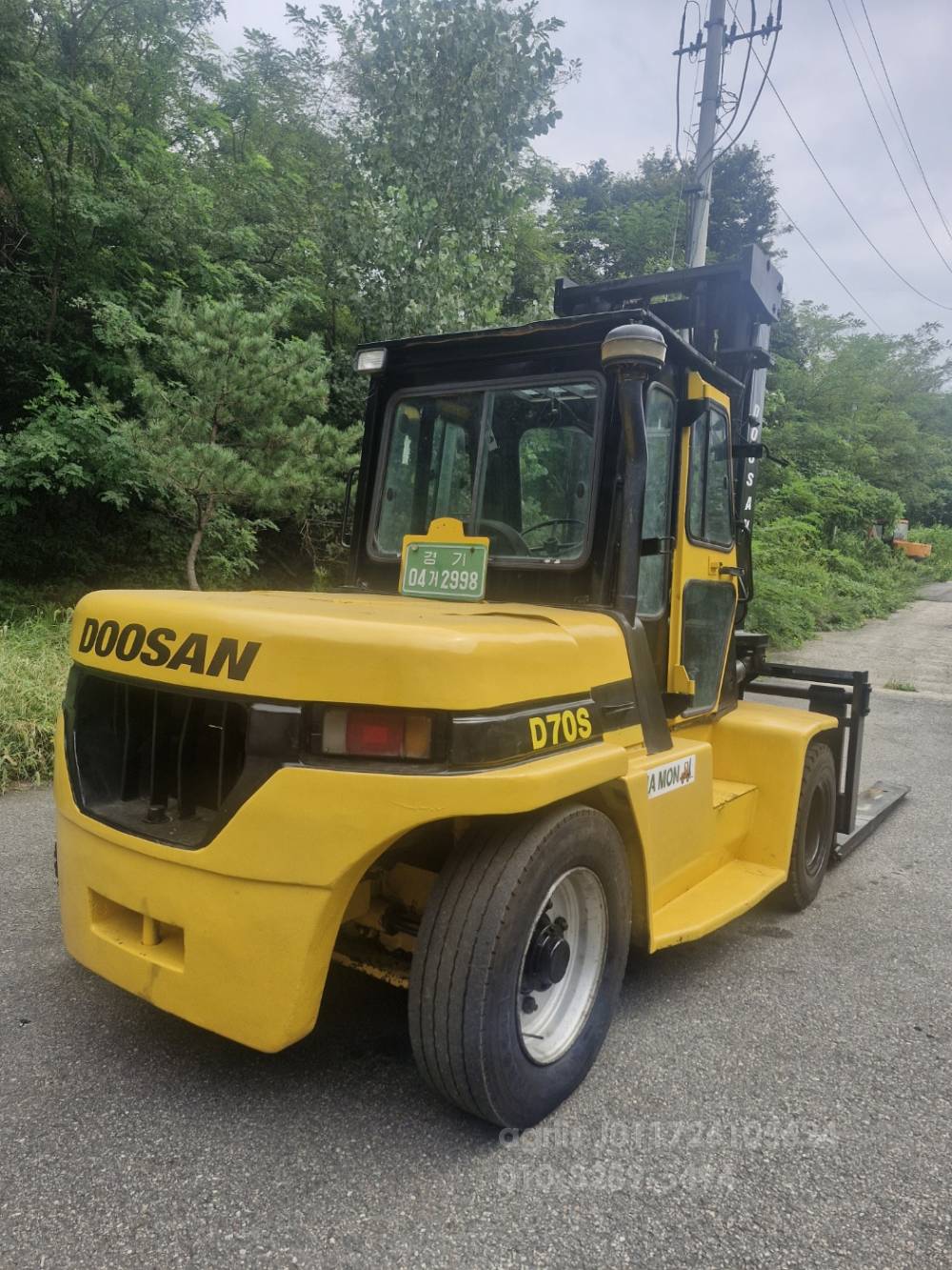 Doosan Forklift 두산7톤 3단마스타자동발 디젤지게차  앞좌측면