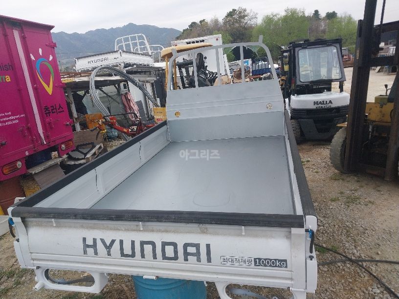  현대 포터2 슈퍼캡 고리7개짜리 적재함입니다  고리7개 수퍼캡  뒤우측면